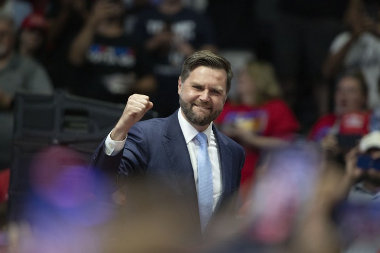 J.D. Vance fist pumps at a joint rally with Donald Trump