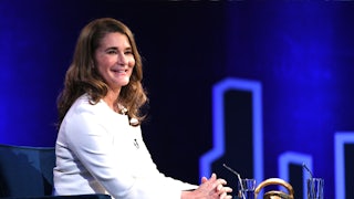 A smiling Melinda Gates glances out at the audience during an interview with Oprah Winfrey