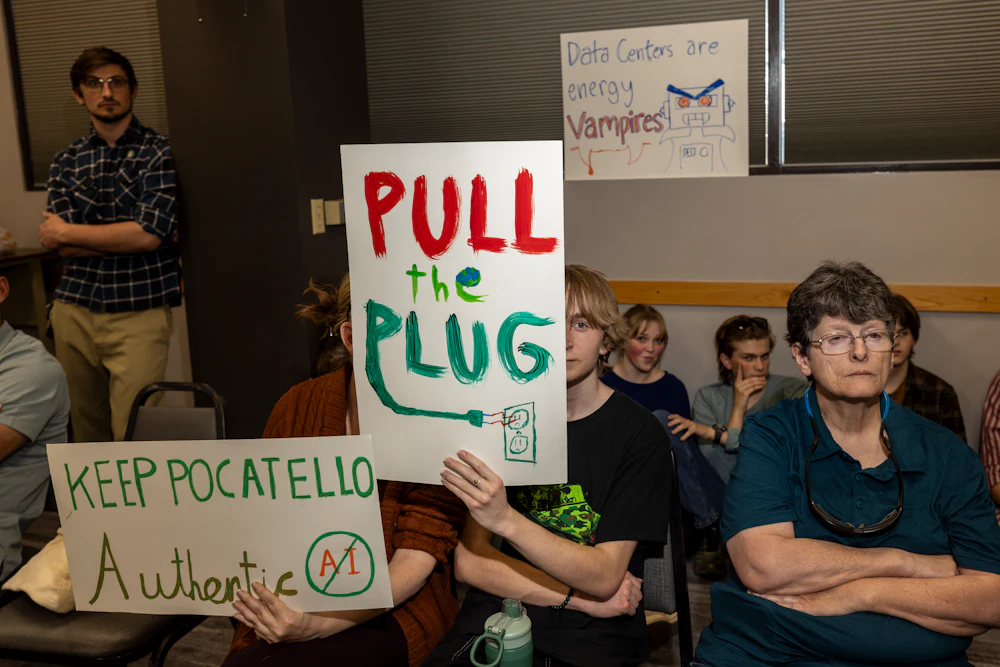 On May 14, community members in Pocatello, Idaho, attended a hearing about the approval of a new data center in the area. Attendees held signs saying "Pull the plug," and "Keep Pocatello Authentic."