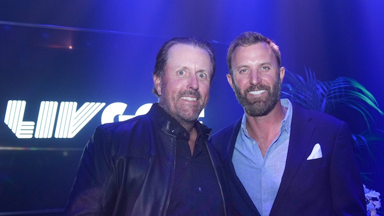 Golfers Phil Mickelson and Dustin Johnson looking normal at a event for Saudi Arabia's new LIV golf league.