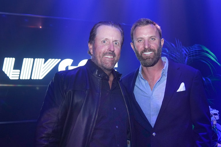 Golfers Phil Mickelson and Dustin Johnson looking normal at an event for Saudi Arabia's new LIV golf league.