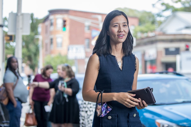 Boston Mayoral candidate Michelle Wu walks outside during the campaign.