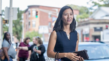 Boston Mayoral candidate Michelle Wu walks outside during the campaign.