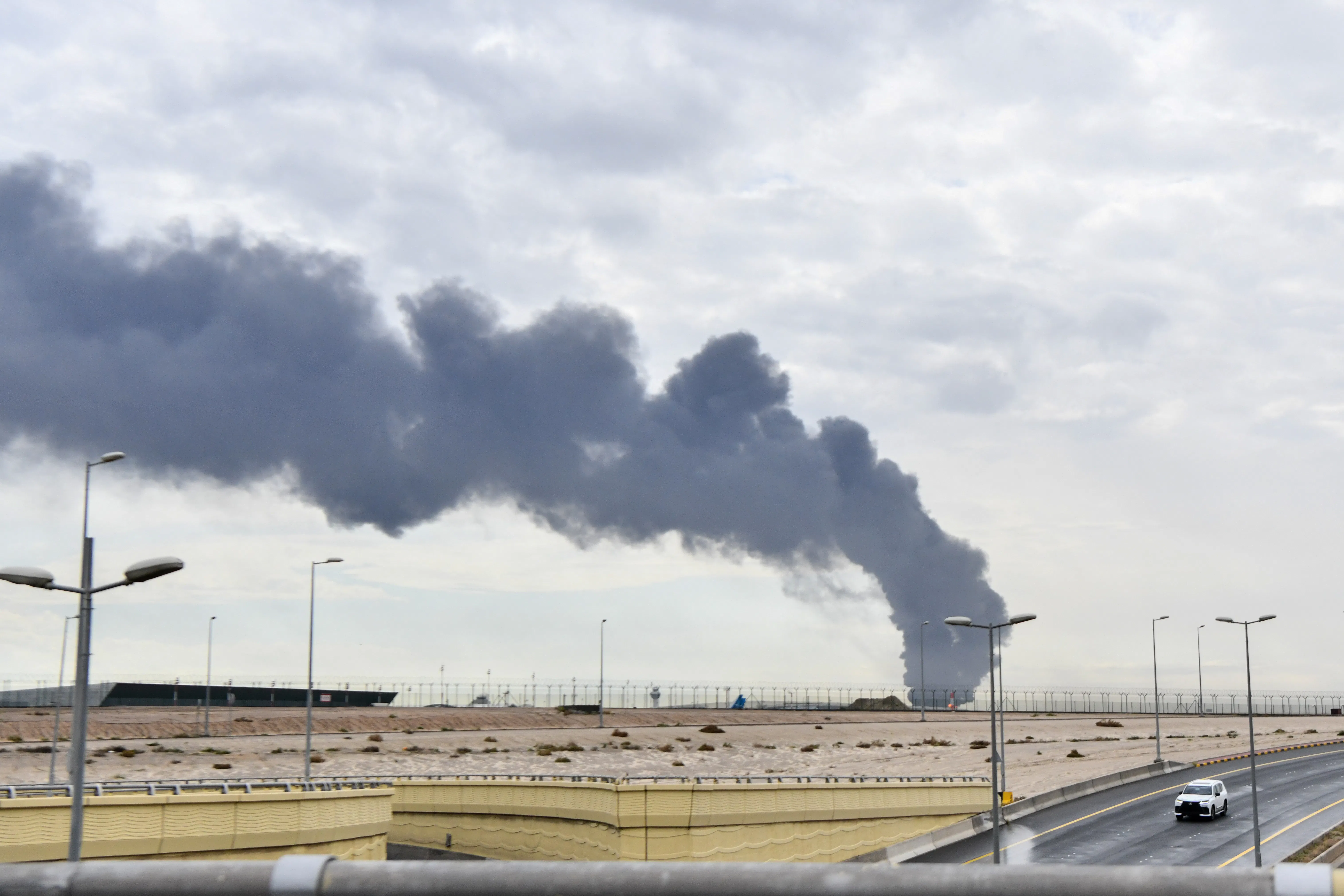 On March 25, smoke rose after an Iranian-sourced unmanned aerial vehicle carried out an attack on a fuel depot at Kuwait International Airport.