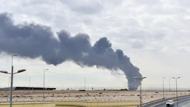 On March 25, smoke rose after an Iranian-sourced unmanned aerial vehicle carried out an attack on a fuel depot at Kuwait International Airport.