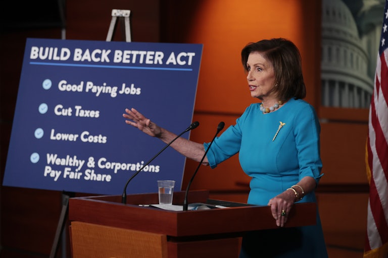Nancy Pelosi gestures at a press conference for the Build Back Better Act