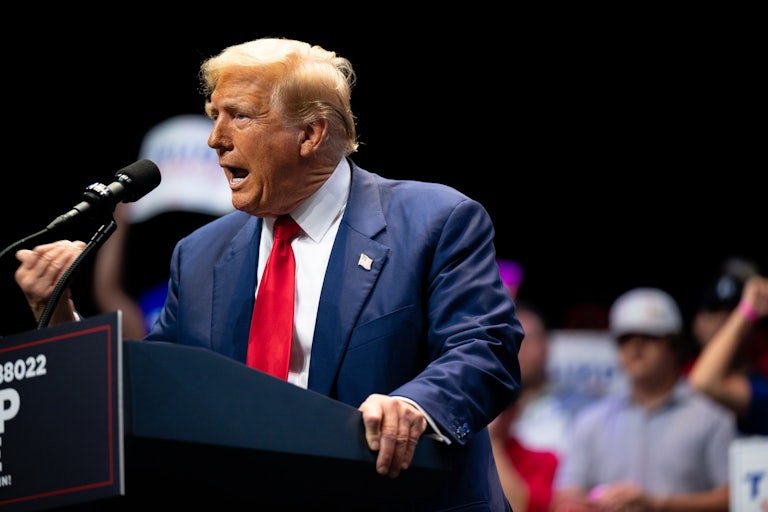 Donald Trump gestures while speaking at a campaign event