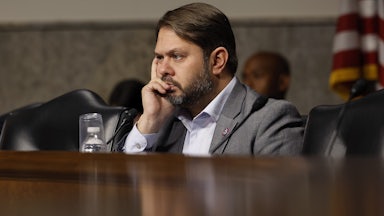 Arizona Representative Ruben Gallego listens during a hearing.