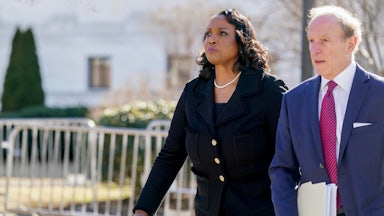Lisa Cook, governor of the U.S. Federal Reserve and her attorney Abbe Lowell outside the U.S. Supreme Court.
