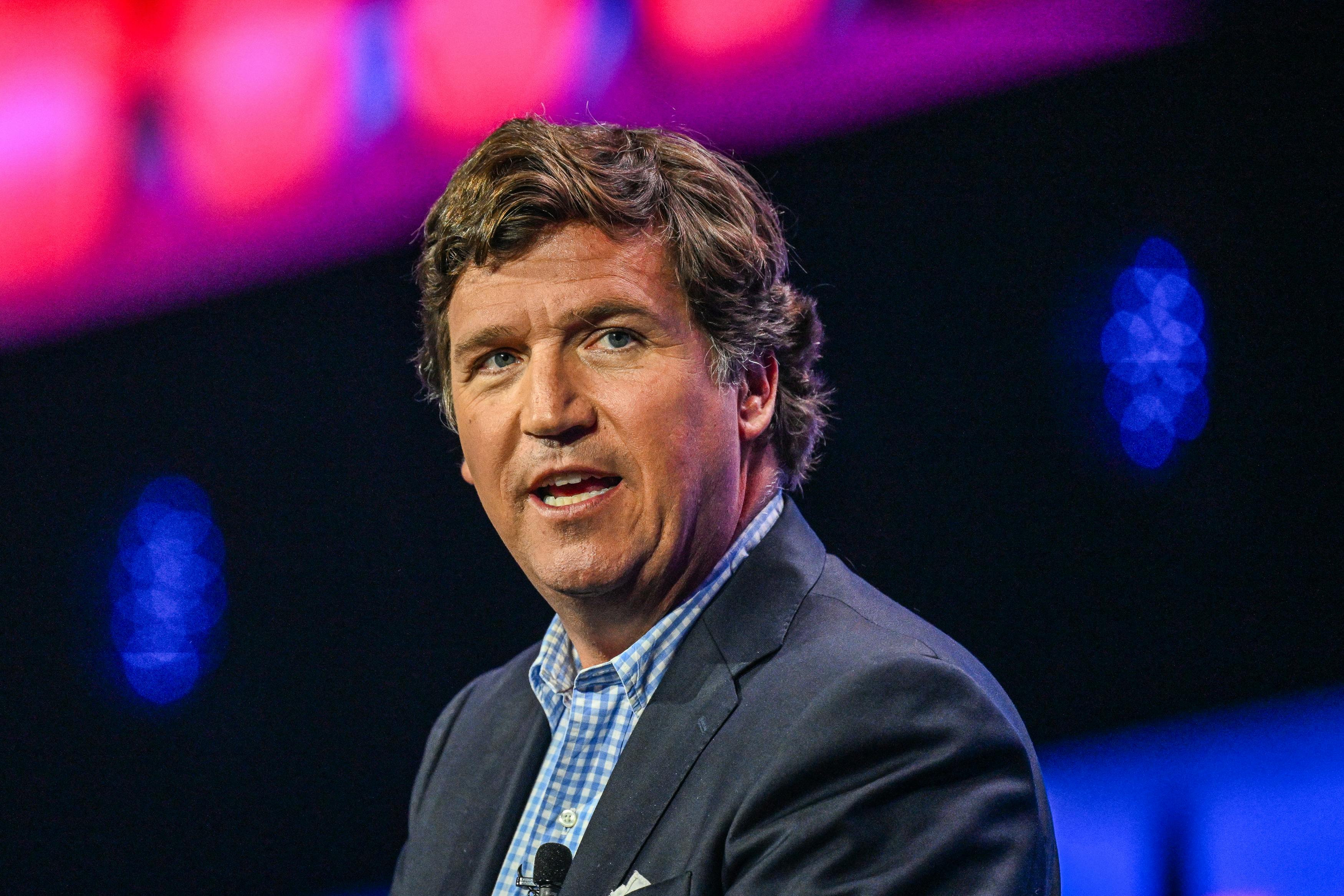 Tucker Carlson speaks at the Turning Point USA conference