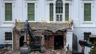 An excavator sits on the rubble after the East Wing of the White House was demolished.