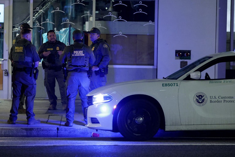 Four members of U.S. Customs and Border Protection wait to be deployed on August 12, 2025 in Washington, DC.