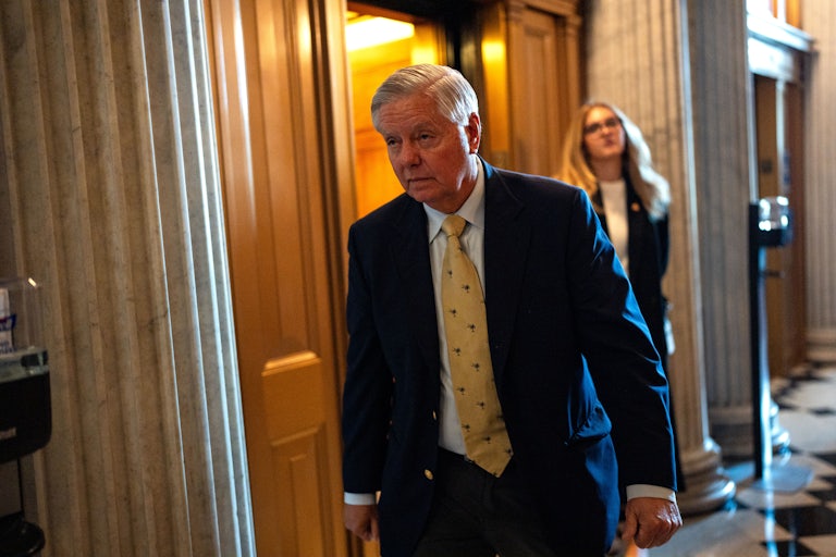 Lindsey Graham walks in the U.S. Capitol