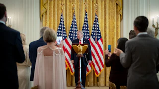 President Donald Trump delivers a speech at the White House.