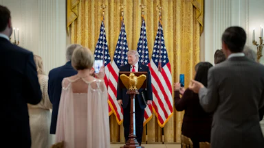 President Donald Trump delivers a speech at the White House.