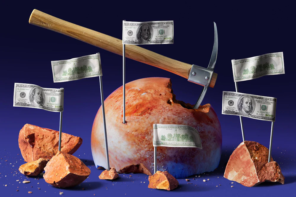 Photo illustration of a pickaxe strikes a cracked planet resembling Mars that has multiple flag poles with dollar bills as the flag indicating monetary value; the pickax is chipping away a chunk of its orange surface and the flags are anchored in the pieces.