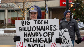 A 2025 protest against a data center planned on southeast Michigan farmland