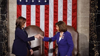 Kamala Harris and Nancy Pelosi shake hands in Congress