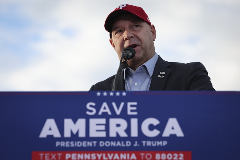 Doug Mastriano speaks at a podium