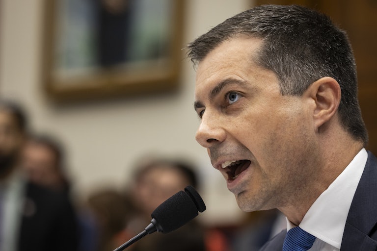Pete Buttigieg speaks into a microphone