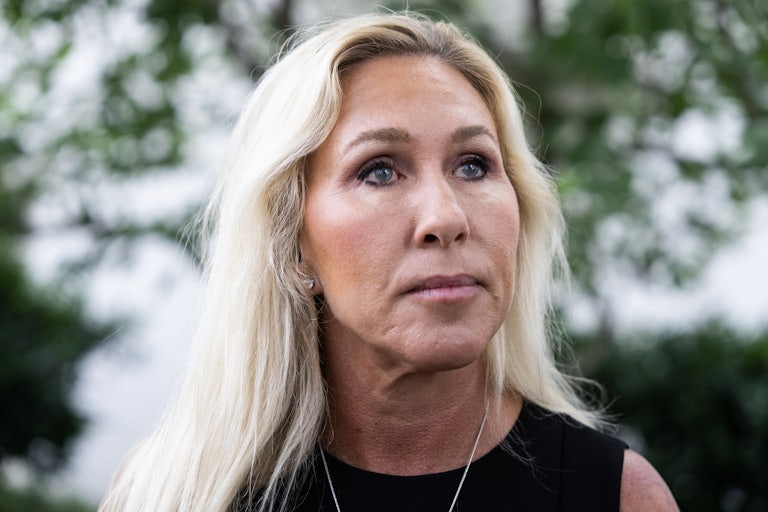 Representative Marjorie Taylor Greene stands outside the Capitol Hill Club in Washington, D.C.