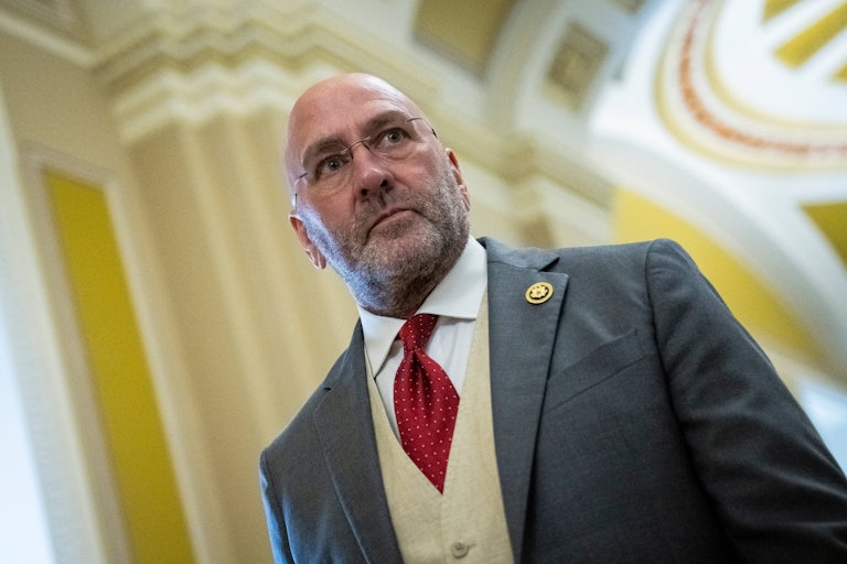 Representative Clay Higgins walks through Congress