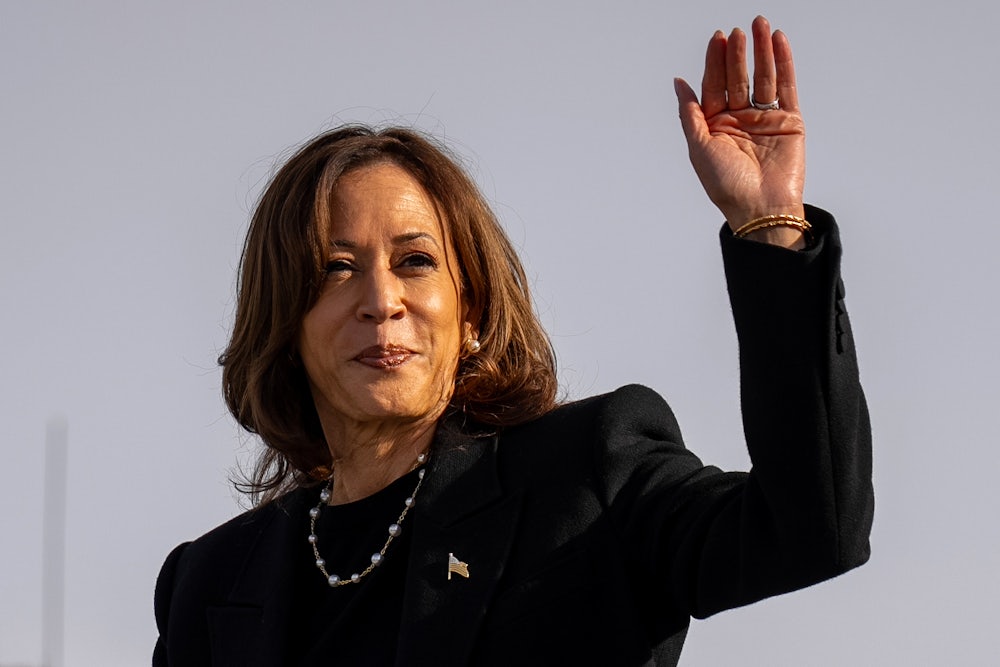 Kamala Harris waves