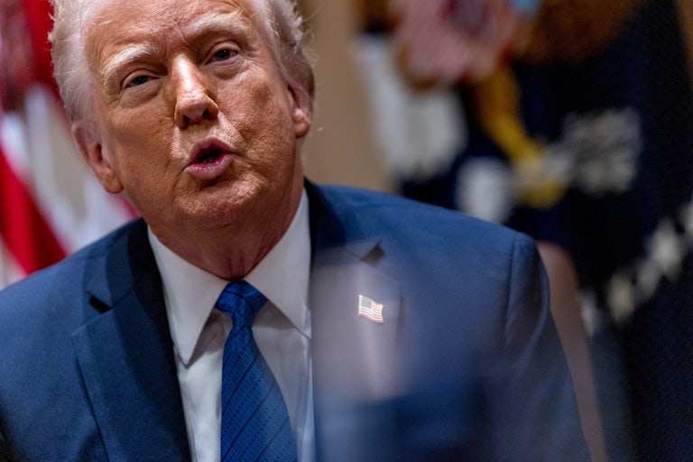 Donald Trump speaks during a meeting at the White House