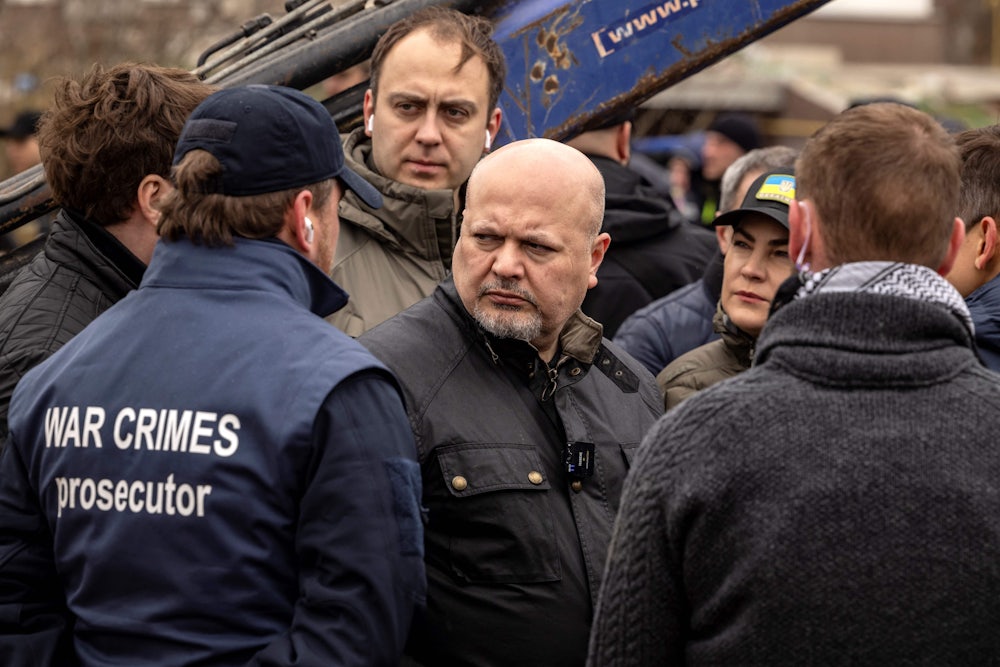 Britain’s Karim Khan, a prosecutor of the International Criminal Court, visits a mass grave in Bucha, on the outskirts of Kyiv, during a war crimes investigation against Russia's military.
