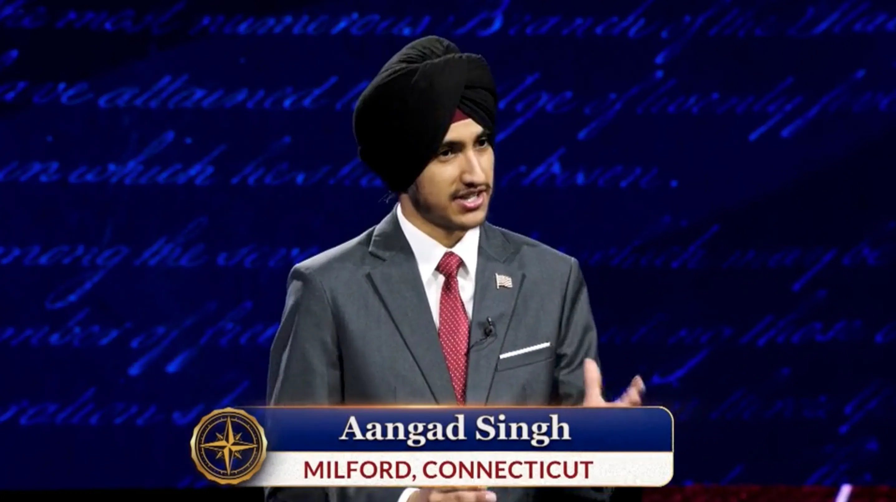 Aangad Singh speaks during the Presidential 1776 Award competition. The chyron notes he is from Milford, Connecticut.