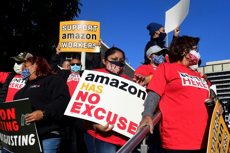 Union leaders in Los Angeles, California, are joined by community group representatives, elected officials and social activists for a rally in support of Alabama Amazon workers' unionization efforts