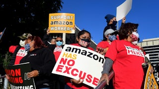 Union leaders in Los Angeles, California, are joined by community group representatives, elected officials and social activists for a rally in support of Alabama Amazon workers' unionization efforts