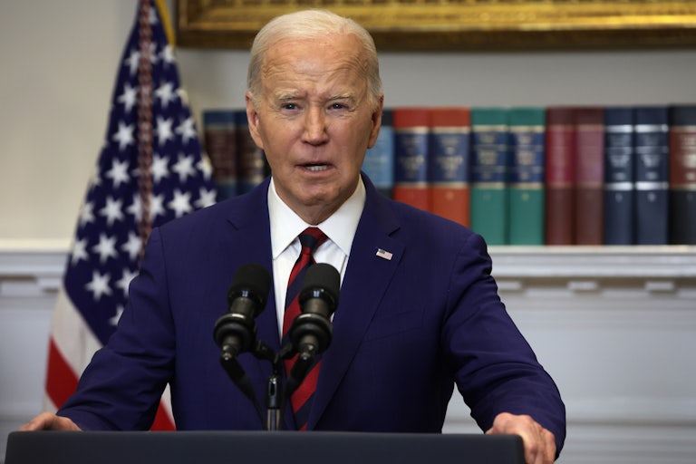 Joe Biden stands at a podium