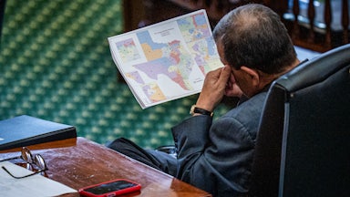 Texas Sen. Pete Flores looks at the proposed redistricting map.