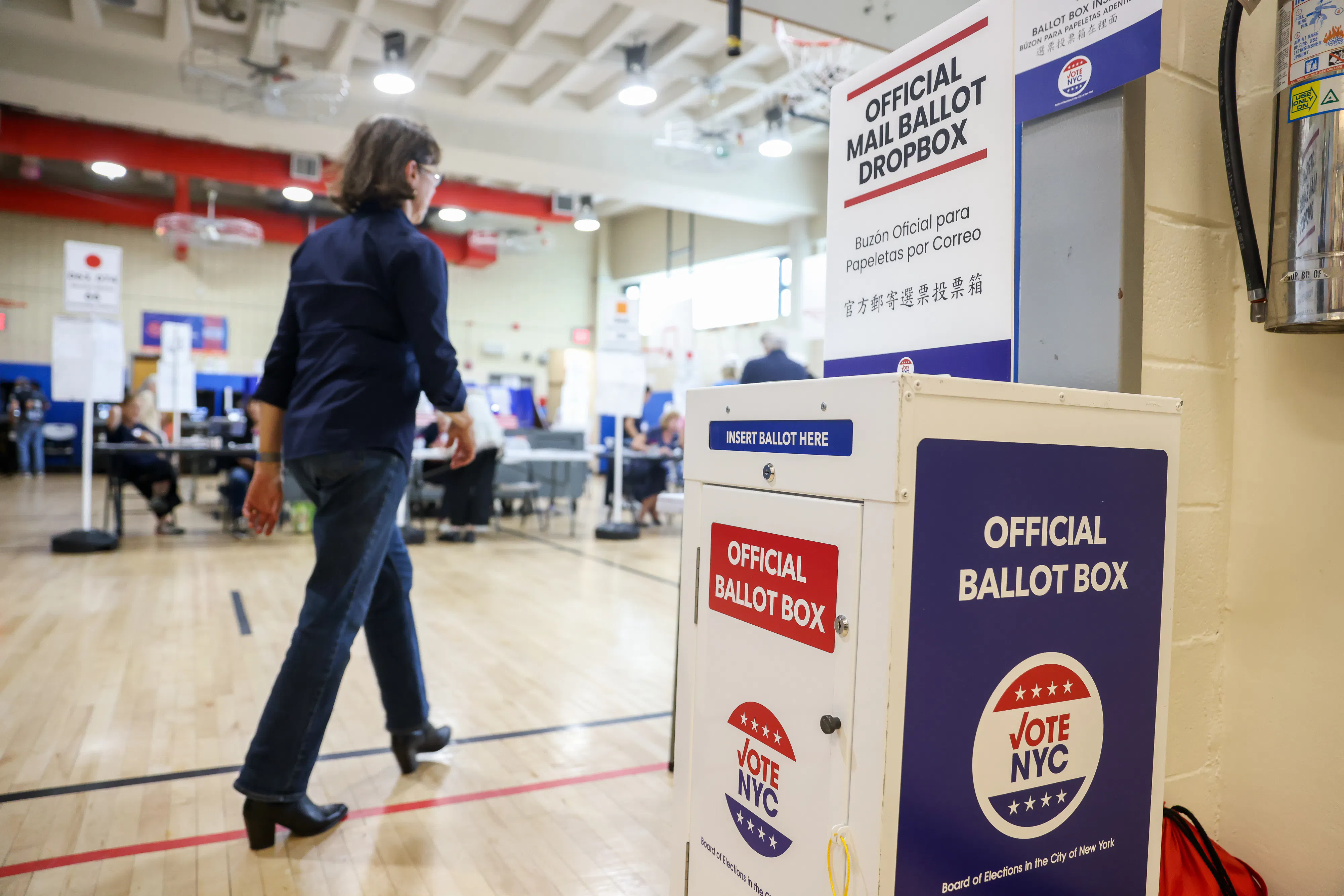 Someone with a mail-in ballot box
