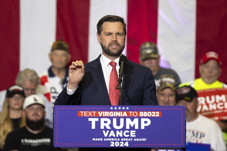 J.D Vance gestures as he speaks at a Donald Trump rally