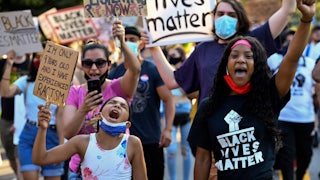 Protesters gather to demonstrate against racial injustice following George Floyd's murder by police in 2020.