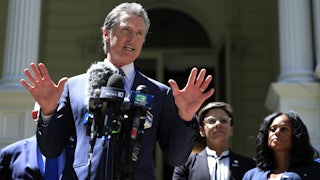 California Gov. Gavin Newsom speaks during a news conference with Texas lawmakers