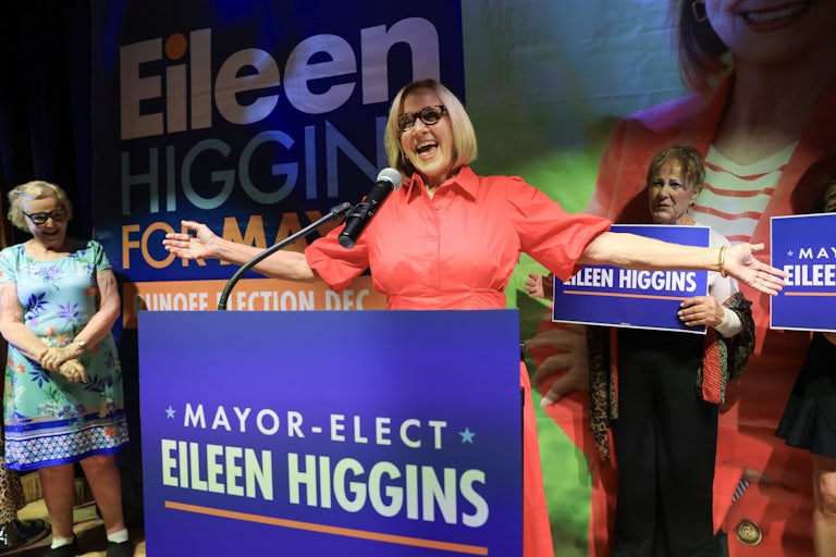 Miami Democratic Mayor-Elect Eileen Higgins holds her arms out to the side and speaks at a podium