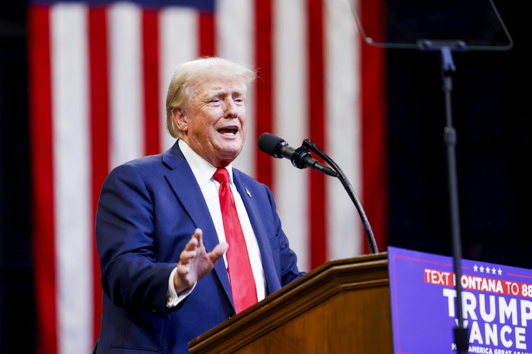 Donald Trump gestures as he speaks at a campaign rally