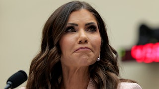 Outgoing Homeland Security Secretary Kristi Noem pulls the corners of her mouth down while sitting in a House committee hearing