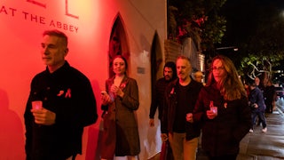 People attend the 14th Annual World AIDS Day candlelight procession in West Hollywood, California.