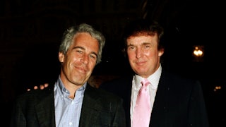 Jeffrey Epstein and Donald Trump smile while standing next to one another. Trump places his hand on Epstein's shoulder.
