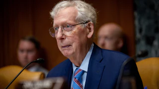 Kentucky Senator Mitch McConnell sits in a Senate committee hearing.