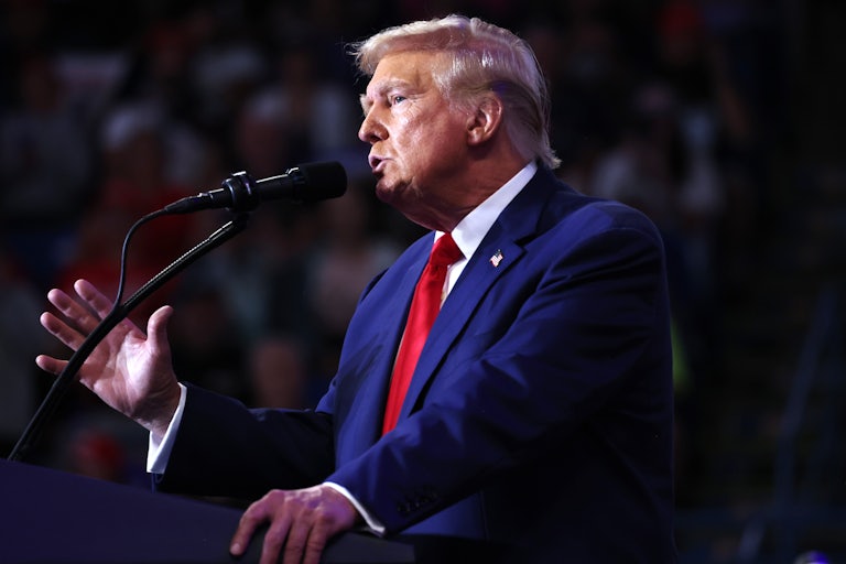 Donald Trump gestures while speaking at a campaign rally