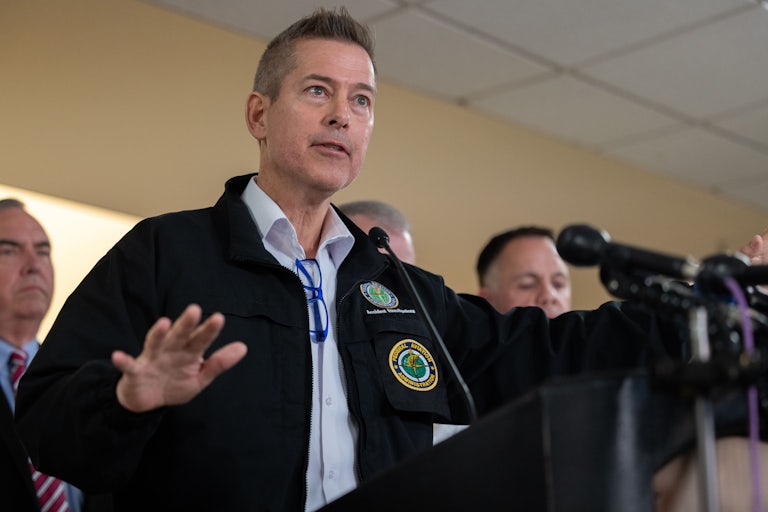 Transportation Secretary Sean Duffy speaks at a lectern at a press conference following the plane crash in Washington, D.C.