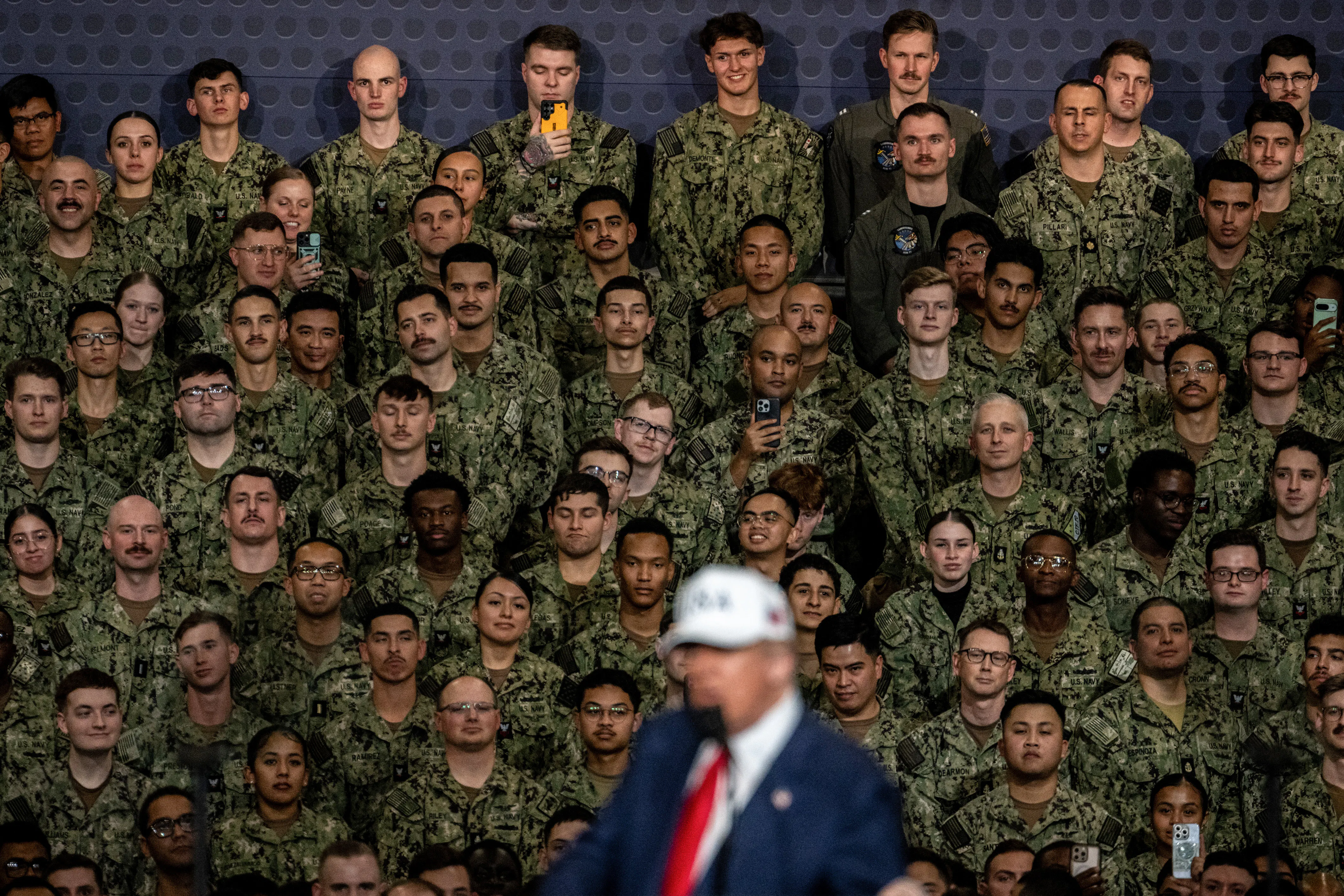 Trump speaks on the USS Washington. 
