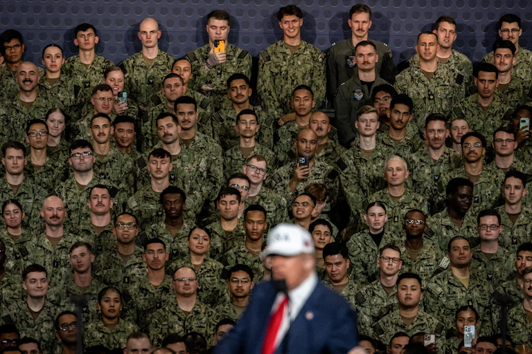 Trump speaks on the USS Washington.