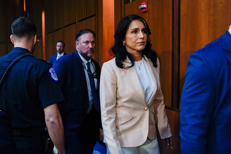 Tulsi Gabbard walks out of a Senate Intelligence Committee hearing