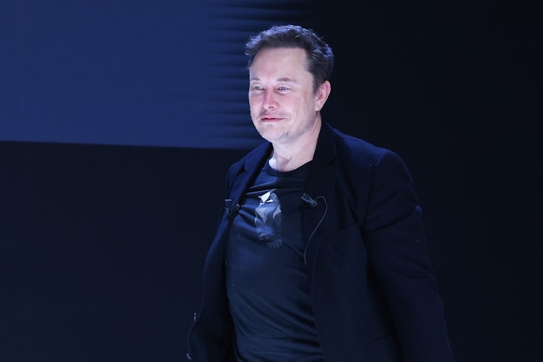 Elon Musk smiles
